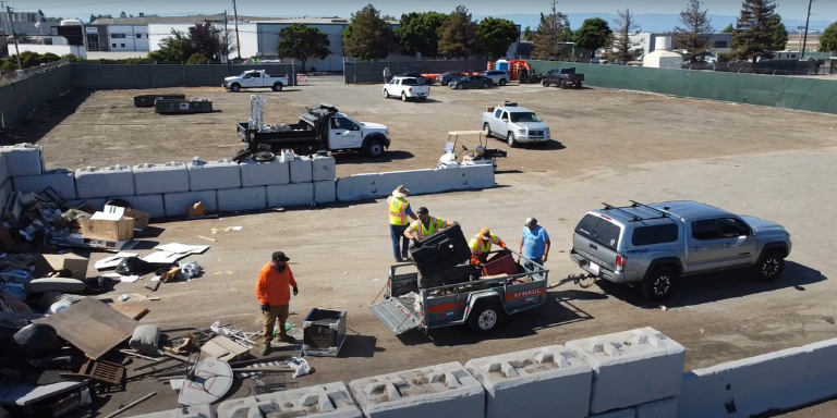 Photo of a truck being emptied at the corp yard.