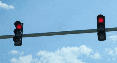 Traffic light turning from red to green