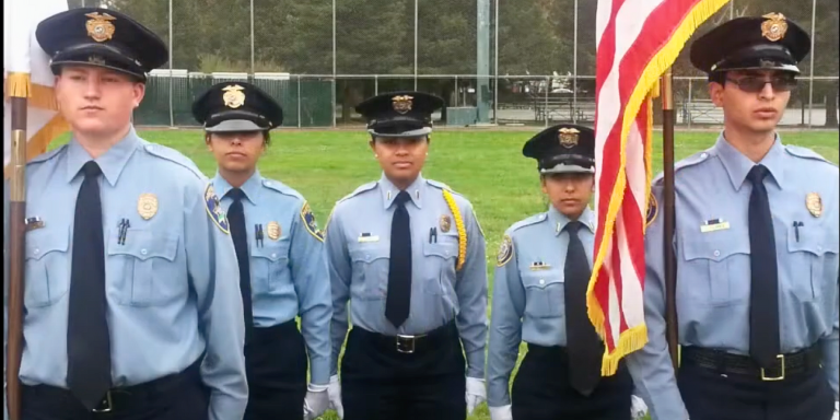 Explorer program students standing at attention