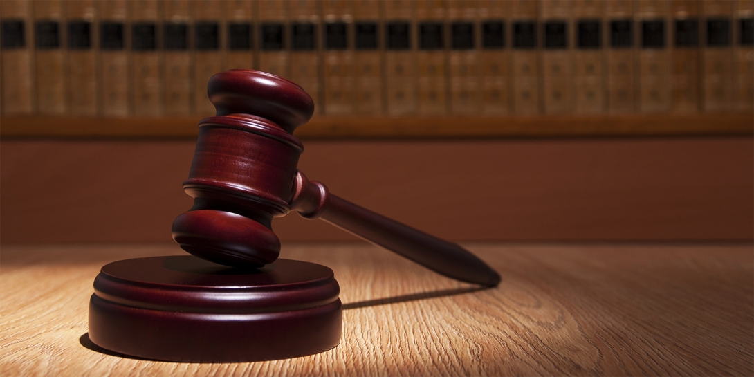 A redwood gavel sitting on a table